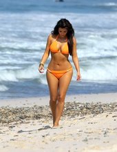 Kim Kardashian Looking Sexy In Orange Bikini 02