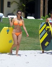 Kim Kardashian Looking Sexy In Orange Bikini 04