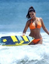 Kim Kardashian Looking Sexy In Orange Bikini 07