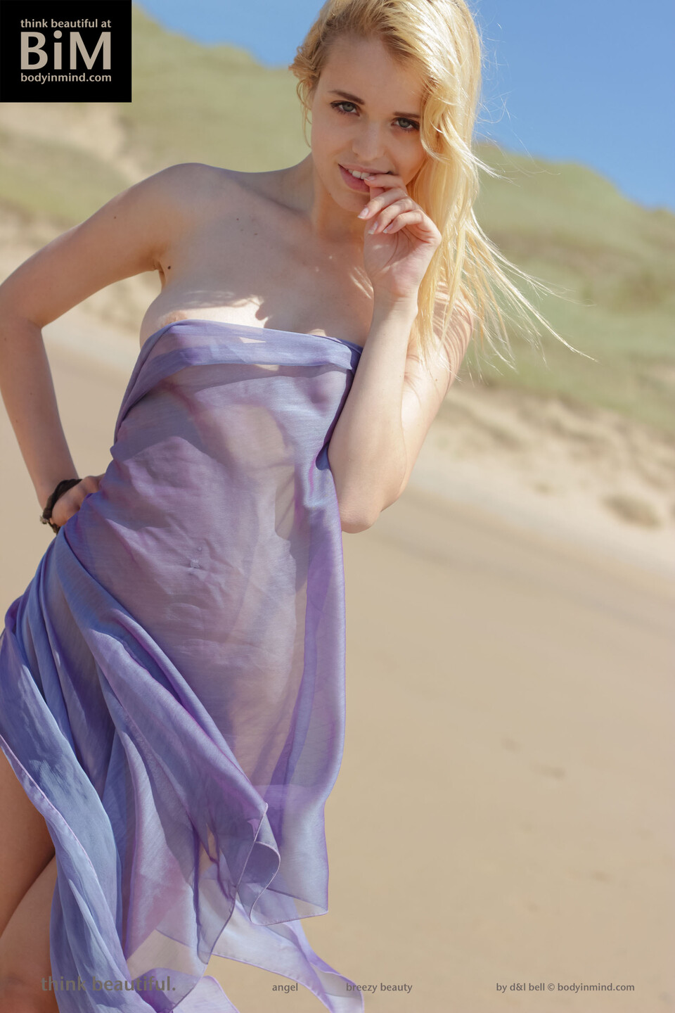 Blonde Beauty In Nude Beach Set