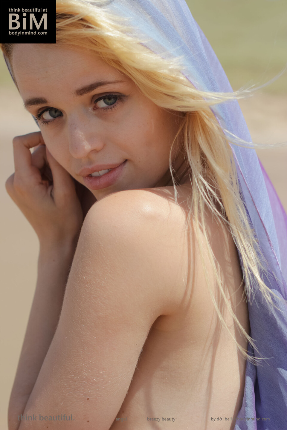 Blonde Beauty In Nude Beach Set