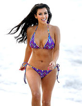 Kim Kardashian poses in bikini 01