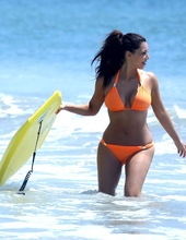 Kim Kardashian Looking Sexy In Orange Bikini 06