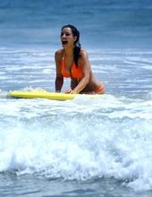 Kim Kardashian Looking Sexy In Orange Bikini 13